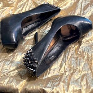 size 9 pewter/silver cones & clear stones on back 5 in heels.New tried on only